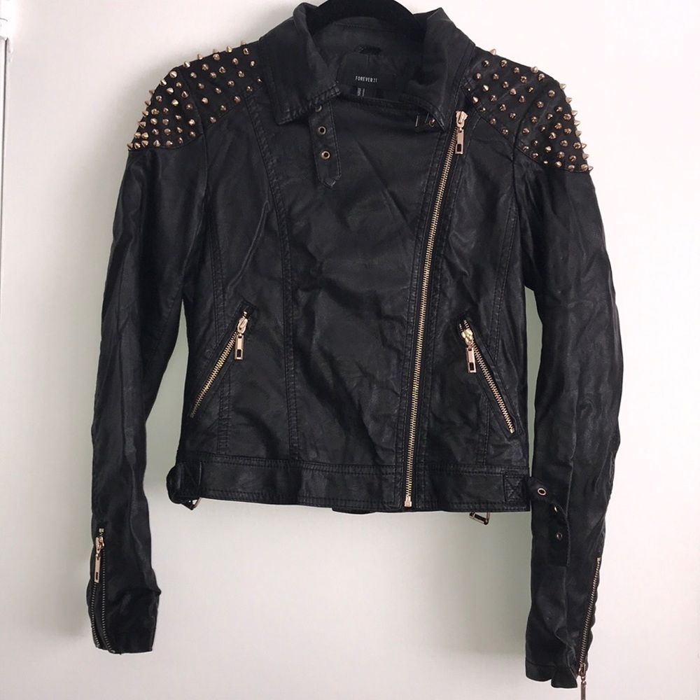 Black faux leather jacket with gold accents